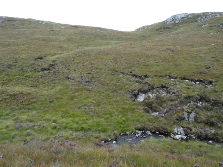 The low spot between the Cnoc an Leathaids, from where I left the path.