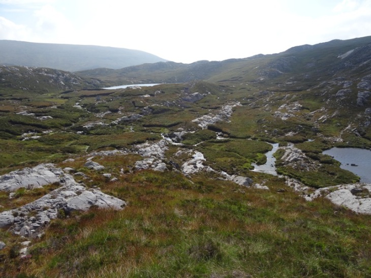 The beautiful saddle filled with lochs and streams (and bogs).