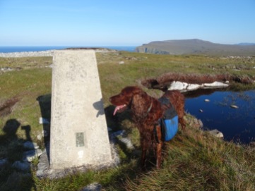Posing dutifully next to the trig point on Dùnan Mòr (looking east towards Kearvaig).