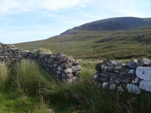 An old house, just inside the fence, next to the Kearvaig River, looking back towards Fashven